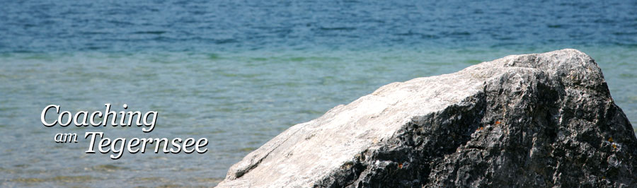 Stein am Strand bei Seeglas